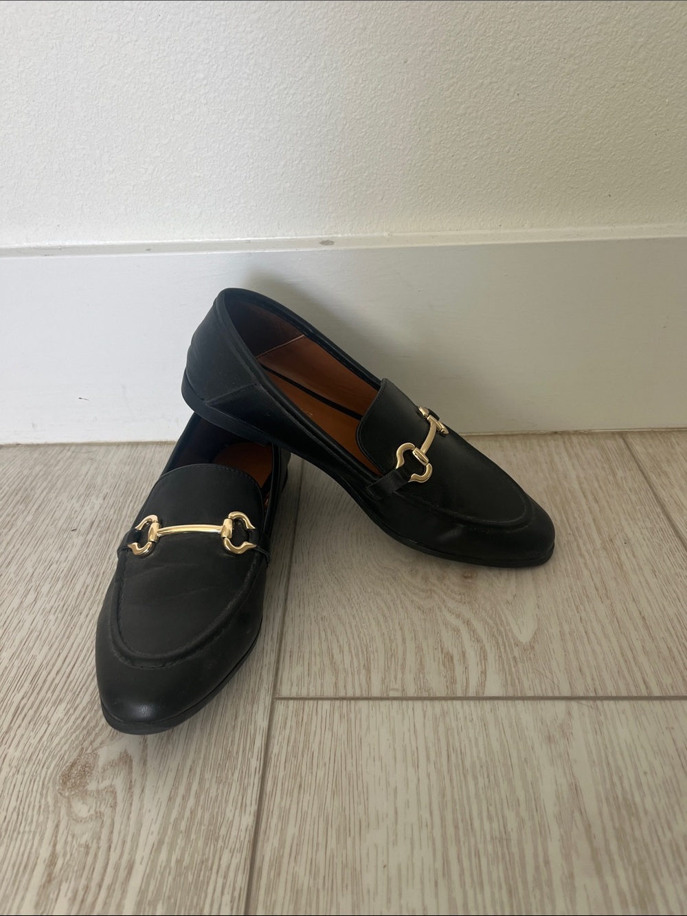 Women’s Black Leather Slip-On Loafers with Gold Horsebit